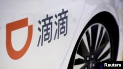 滴滴出行在北京一辆汽车上的标识 (2018年10月18日)