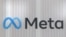 FILE - The logo of Meta is seen at the entrance of the company's temporary stand ahead of the World Economic Forum in Davos, Switzerland, Jan. 18, 2025.
