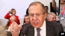Russian Foreign Minister Sergei Lavrov talks to journalists before an informal ministerial meeting of the Organization for Security and Cooperation in Europe, OSCE, in Mauerbach near Vienna, Austria, July 11, 2017. 