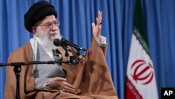 In this picture released by an official website of the office of the Iranian supreme leader, Ayatollah Ali Khamenei speaks at a meeting with a group of Revolutionary Guards and their families, in Tehran, Iran, April 9, 2019.