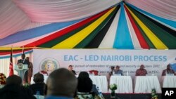 Rais wa Kenya William Ruto akizungumza wakati wa uzinduzi wa majadiliano ya kutafuta amani DRC, Nairobi, Novemba 28, 2022.Picha ya AP