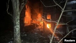 An apartment building damaged in the aftermath of an attack, amid Russia's attack on Ukraine, in a location given as Selydove, Donetsk region, Ukraine, in this still image released on Feb. 14, 2024. (Vadym Filashkin via Telegram/Handout via REUTERS).