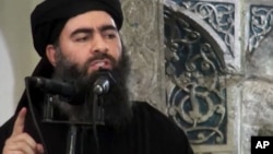 Abu Bakr al-Baghdadi, Shugaban Kungiyar ISIL a Birnin Mosul.