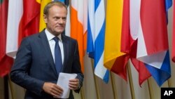 European Council President Donald Tusk prepares to address a news conference at the EU Council building in Brussels, June 24, 2016. 