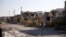 FILE - Destroyed buildings are seen in the city of Ramadi, January 16, 2016. Ramadi was freed of IS extremists in December 2015 after a fierce battle and more than 600 bombings left much of the city in ruins, 100 kilometers west of the capital, Baghdad.