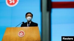 李家超在5月9日会见记者