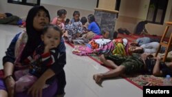 Police fire tear gas shells to disperse students taking part in an anti-government protest demanding the resignation of Sri Lanka&#39;s President Gotabaya Rajapaksa over the country&#39;s crippling economic crisis, in Colombo.