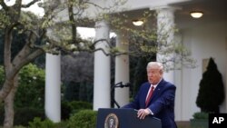 President Donald Trump speaks during a coronavirus task force briefing in the Rose Garden of the White House, March 29, 2020, in Washington. 