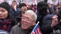 纽约万人集会声援华裔前警员梁彼得