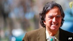 FILE - Former New Mexico Gov. Bill Richardson emerges from his office in Santa Fe, NM, March 9, 2020. 