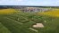 An aerial view shows corn stalks planted by Ukrainian farmers in the shape of the national coat of arms, trident, ahead of the country's 30th anniversary of independence, in a field near Boryspil International Airport outside Kyiv, July 22, 2021. (Gleb Garanich/Reuters)