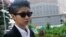 This photograph taken on April 2, 2013 shows Singaporean artist Samantha Lo Xin Hu, 26, arriving at the Subordinate courts in Singapore.