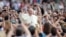 Pope Francis greets supporters on Aug. 8, 2014.