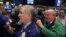 Traders work on the floor of the New York Stock Exchange shortly before the closing bell in New York, Jan. 6, 2017. 