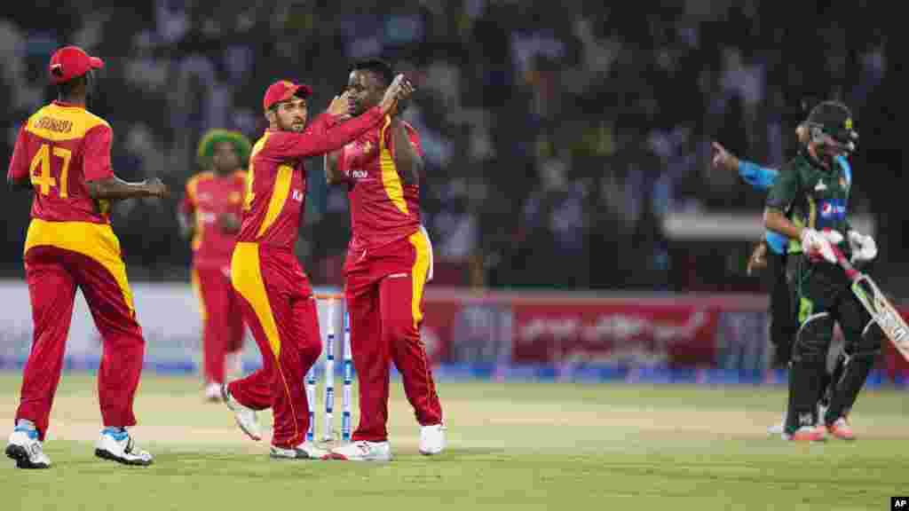 Mount Sinabung volcano spews reddish smoke and ash, as seen from the Karo district in North Sumatra province, Indonesia.