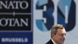 Italian Prime Minister Mario Draghi arrives for the NATO summit at the Alliance's headquarters, in Brussels, Belgium, June 14, 2021.