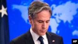 US Secretary of State Antony Blinken pauses as he speaks about Russia and Ukraine during a briefing at the State Department on Jan. 26, 2022, in Washington.