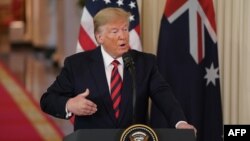 Presiden AS Donald Trump saat konferensi pers bersama PM Australia Scott Morrison (tidak tampak) di Gedung Putih, Jumat (20/9). 