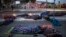 Migrants sleep on a street near the Chaparral border crossing in Tijuana, Mexico, Nov. 23, 2018. 