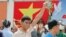 Người dân Việt Nam xuống đường tuần hành chống Trung Quốc tại TP HCM hồi tháng 5, 2014. 