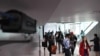 A thermal scanner monitors arriving passengers at Phnom Penh international airport in Cambodia, Jan. 22, 2020.