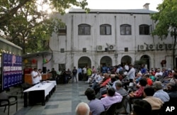 Press Club of India President Gautam Lahiri addresses a gathering of journalists in New Delhi, India, April 3, 2018. India's Ministry of Information and Broadcasting on Tuesday withdrew a sweeping new order clamping down on journalists accused of spreading fake news.
