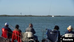 Pecaroši kod Braunsvila u Teksasu čekaju planirano poletanje Spejs eksovog Staršipa, 17. aprila 2023. Foto: Rojters/Go Nakamura