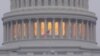 FILE - A United States flag flies in front of the U.S. Capitol dome in Washington, Nov. 6, 2018.