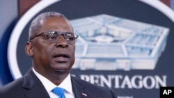 Defense Secretary Lloyd Austin speaks at a press briefing at the Pentagon, July 21, 2021 in Washington.