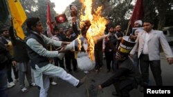 Yan shiya sun kone kamanin sarkin Saudiya Salman Ibn Abdulaziz