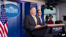 Secretary of State Mike Pompeo and Treasury Secretary Steven Mnuchin answer questions during a briefing at the White House, in Washington, Sept. 10, 2019. 