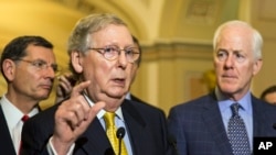 Mitch MCconnel ke nan shugaban Majalisar Dattawa yana sanar da dakatar da kada kuri'a kan sabuwar dokar inshorar kiwon lafiya