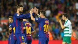 Gerard Piqué e Lionel Messi