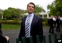 FILE - Donald Trump Jr., the son of President Donald Trump, speaks to reporters outside the White House in Washington, April,17, 2017.