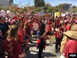 Demonstrators gather for “A Day Without a Woman,” an event coinciding with International Women’s Day, in Los Angeles, March 8, 2017. (E. Lee/VOA)
