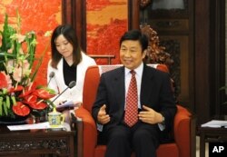 中国副主席李源潮在中南海会见西班牙外长（2013年6月25日）