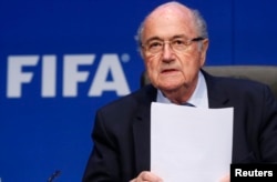 Re-elected FIFA President Sepp Blatter arrives for a news conference after an extraordinary Executive Committee meeting in Zurich, Switzerland, May 30, 2015.