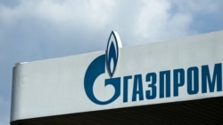 FILE - The logo of Russia's energy giant Gazprom is pictured at one of its gasoline stations in Moscow, April 16, 2021.