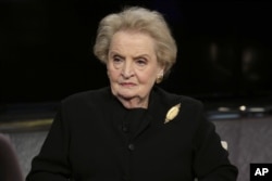 FILE - Former U.S. Secretary of State Madeleine Albright is seen during an interview in New York, March 2, 2016. Albright says the United States "will need all the help we can get to repair the damage he [Donald Trump] is doing to our country's international reputation and interests."