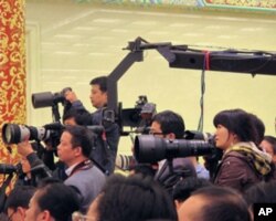 记者会上的摄影和摄像记者