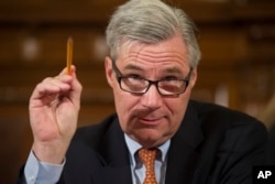 FILE - Sen. Sheldon Whitehouse, D-R.I., speaks on Capitol Hill in Washington, Jan. 11, 2017.