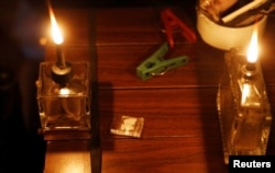 A sachet of "shabu," or methamphetamine, is pictured between lamps inside a drug den in Manila, Philippines, Feb. 13, 2017.