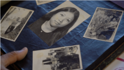 FILE - A Photo of Ros Sopheap, Executive Director of Gender and Development for Cambodia (GADC), in her youthful time during late 1980s to 2000s, from her personal album, in Phnom Penh, July 6, 2021. (Khan Sokummono/VOA Khmer)