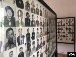 Photos of prisoners during the Khmer Rouge regime, displayed at the Tuol Sleng Genocide Museum in Phnom Penh, Cambodia. (Sun Narin/VOA Khmer)