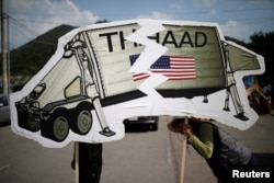 FILE - Protesters attend an anti-THAAD protest in Seongju, South Korea.