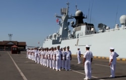 FILE - Cambodian navy officials attend a ceremony after conducting an exercise with Chinese naval officers in Preah Sihanouk province, Cambodia, on February 26, 2016. REUTERS/Samrang Pring