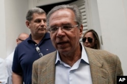 Paulo Guedes, head economic adviser of President-elect Jair Bolsonaro, leaves after a meeting with Bolsonaro and members of his party and campaign, to discuss the presidential transition in Rio de Janeiro, Brazil, Oct. 30, 2018.