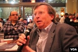 FILE - A participant asks a question during a Kleptocracy and Democracy Debate in Washington, D.C., Dec. 1, 2016. (Say Mony/VOA Khmer)