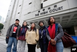 Eni Lestari (berdiri paling kanan) bersama rekan-rekan aktivis lain saat memperjuangkan hak pekerja migran untuk mendapatkan izin tinggal tetap di Hong Kong, tahun 2012 lalu.