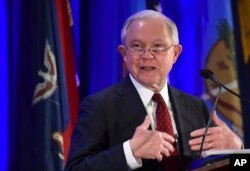 FILE - Attorney General Jeff Sessions delivers remarks to the National Association of Attorneys General at their Winter Meeting in Washington, Feb. 27, 2018.